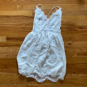 White lace tie back mini dress